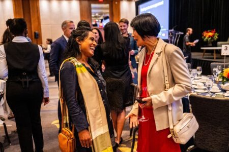 Co-Artistic Director Miriam Fernandes laughs with Toronto Mayor Olivia Chow.